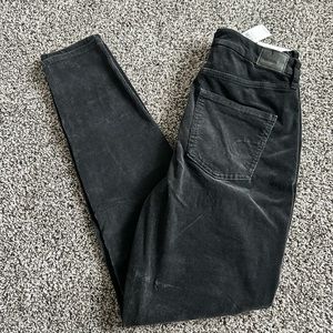 Black corduroy skinny jeans